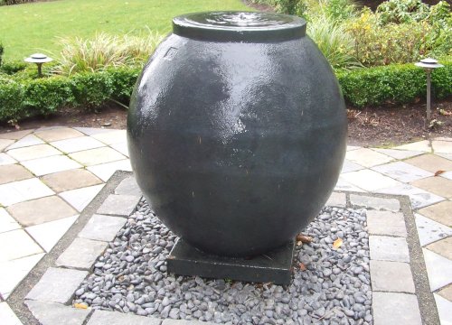 https://www.stangelandlandscape.com/wp-content/uploads/2014/08/water-feature-pot-1000x600.jpg