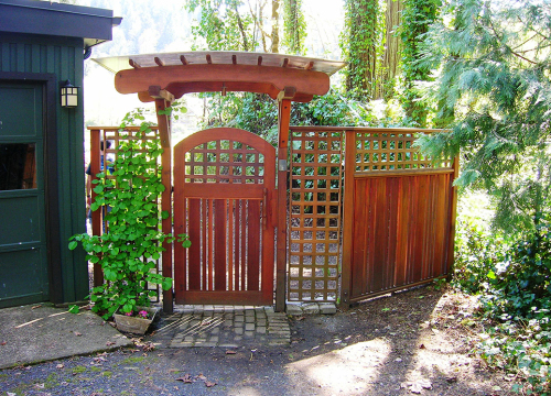 https://www.stangelandlandscape.com/wp-content/uploads/2015/07/custom-wood-arbor-gate-1000x600.jpg